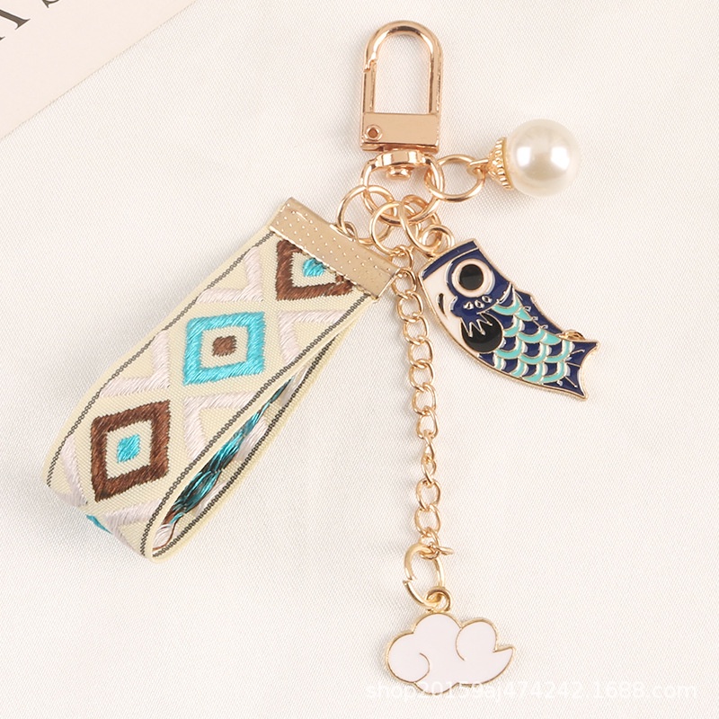 Móc khóa hình đám mây đính ngọc trai giả mới