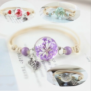 Vòng tay mặt quả cầu thuỷ tinh có hoa khô bên trong