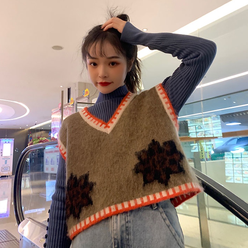 Áo khoác nữ cộc tay cổ bẻ form dài rộng thời trang Hàn