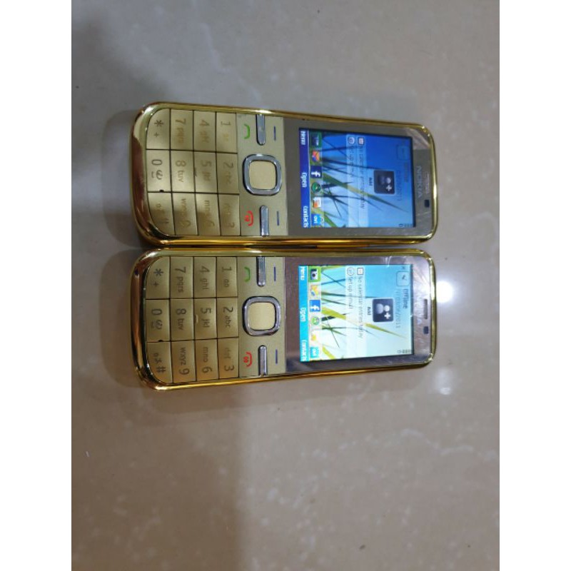 Điện thoại Nokia C5-00 vàng, kèm pin sạc