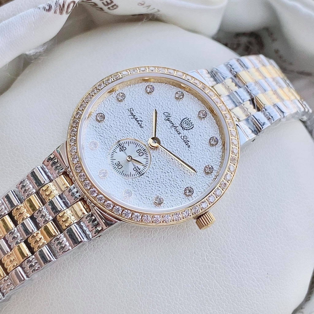 Đồng Hồ Nữ OLympia Star OPA55958DLSK-T mặt khảm ấn tượng có kim rốn cùng dây demi mạ vàng PVD