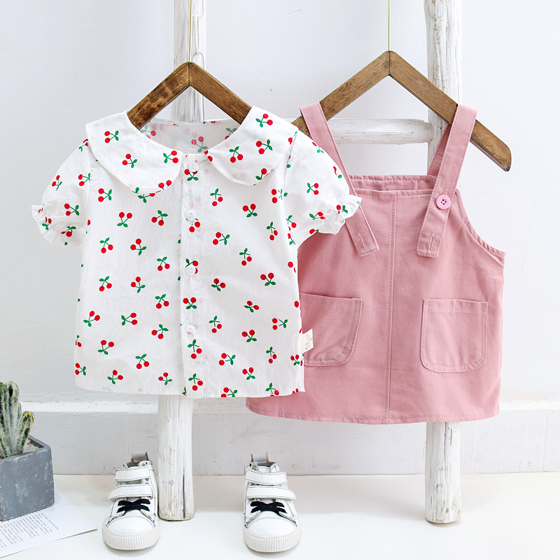 Bộ áo kiểu sơ mi ngắn tay in hình quả cherry + đầm yếm hai dây dáng ngắn xinh xắn cho bé gái từ 0-5 tuổi