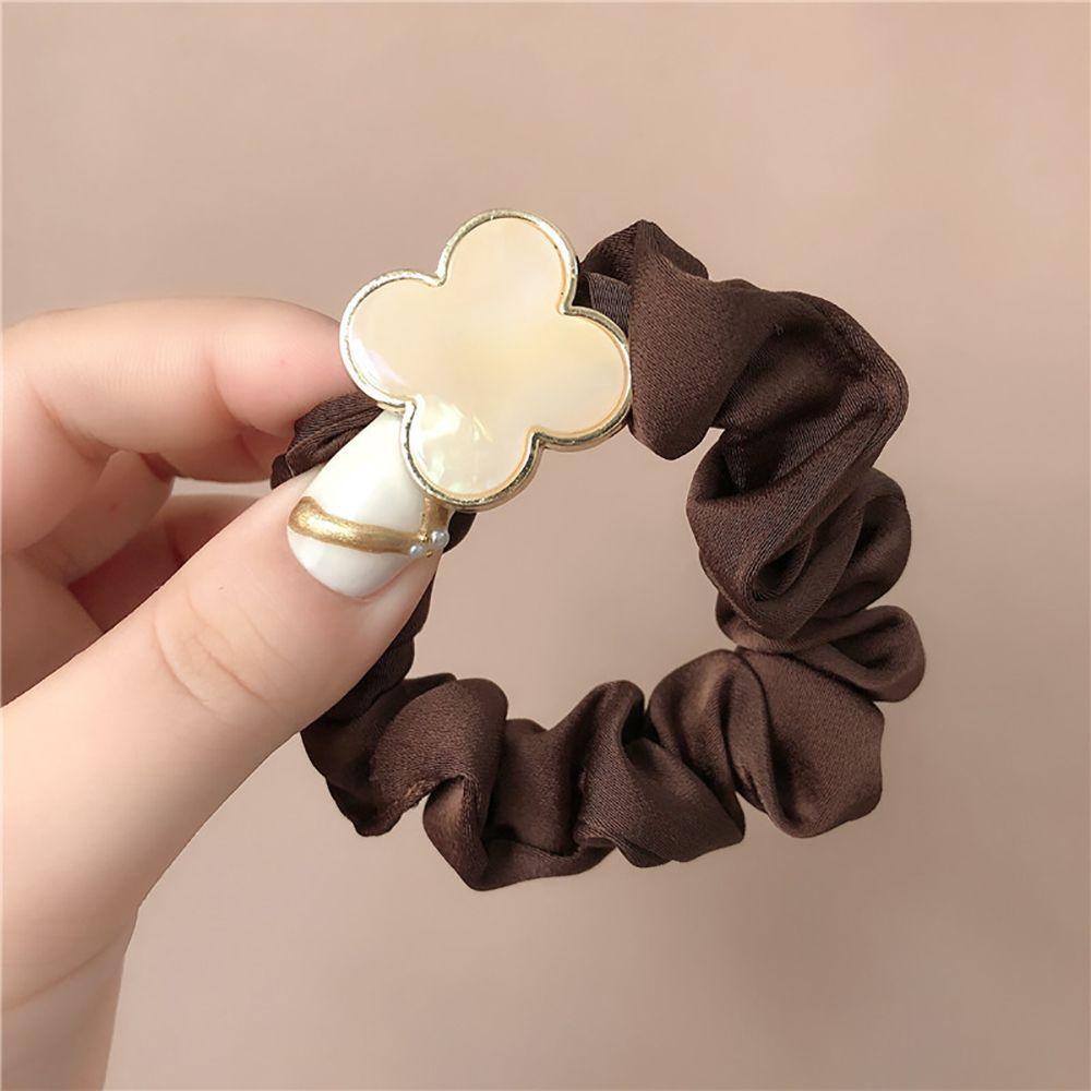 Dây Buộc Tóc Co Giãn Hình Cỏ Bốn Lá Bằng Hợp Kim Cho Nữ