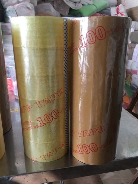 1 cuộn băng keo 100YA ,200gr trong hoặc đục