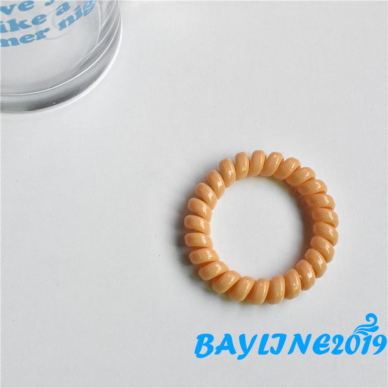 Dây buộc tóc co giãn màu trơn xoắn ốc không để lại dấu vết cho nữ