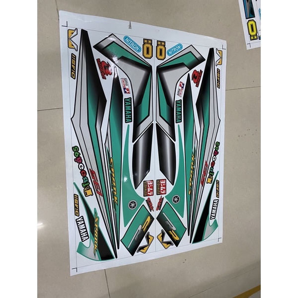 ( Quí khách vui lòng mang ra tiệm cho thợ dán ) ex 2010 xanh dán xe đen