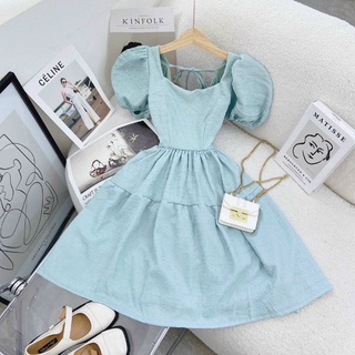 Đầm bbd gấm xanh tay bồng hở lưng
