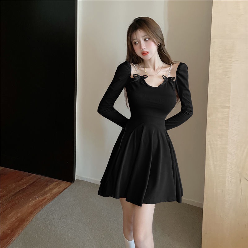 Long sleeved dress women's autumn decoration body temperament short skirt with thin waist and bow design sense, small and fluffy skirt