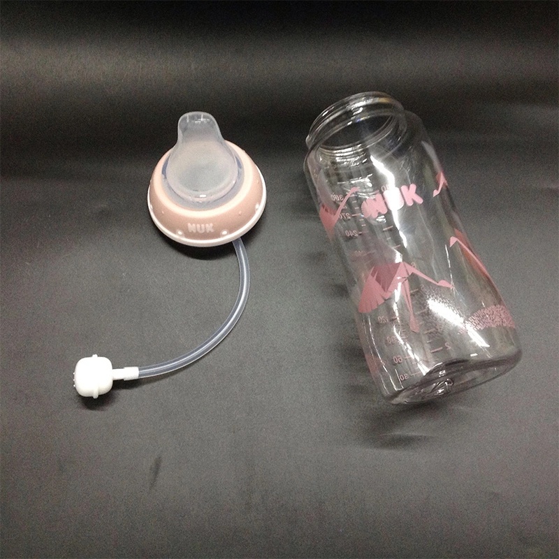 Núm ti giả có ống hút thay thế cho bình sữa NUK