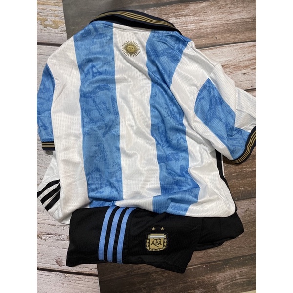Set bộ quần áo thể thao nam nữ argentina có cổ áo trắng sọc xanh quần đen vải gai thái 2022 2023