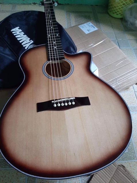 Đàn guitar acoustic + capo fender