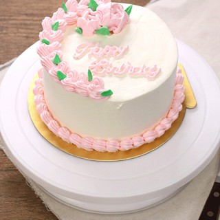 Rotating base holder for cake decoration