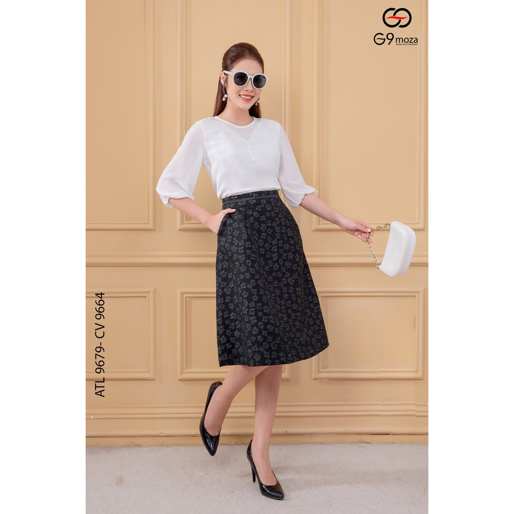 Áo sơ mi nữ tay lỡ G9moza 9679 với chất liệu cát hàn kết hợp họa tiết tạo nên phong cách trẻ trung điệu đà