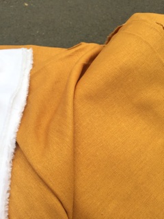 Vải linen bột màu vàng bò.