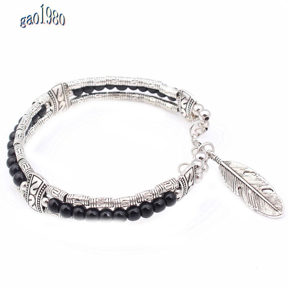 Vòng Tay Hạt Đá Lam Ngọc Phối Lông Vũ Phong Cách Tây Tạng Dành Cho Nam Và Nữ