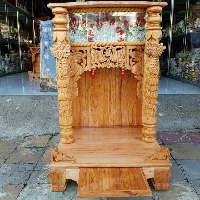 Bàn thờ thần tài ông địa gỗ xoan ngang 56 cm quỳ trụ điện tử