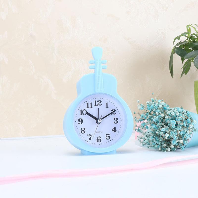 Đồng hồ để bàn hình cây đàn.. (màu ngẫu nhiên).GREAT