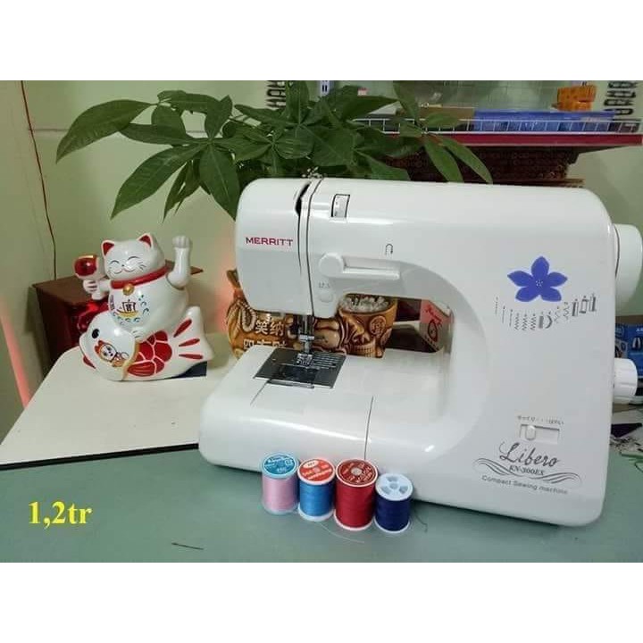 Máy may singer hoa tím