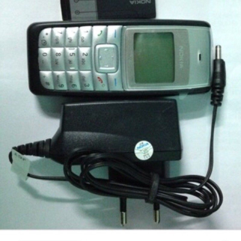 xạc nokia 110i chân tròn to