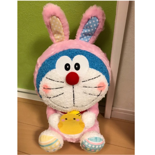 Doraemon Thỏ Hồng + Doraemon Vàng Xù Ôm Hoa