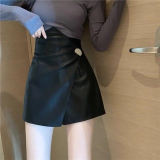 CHẤN VÁY DA ĐÍNH KHUY ĐỒNG
