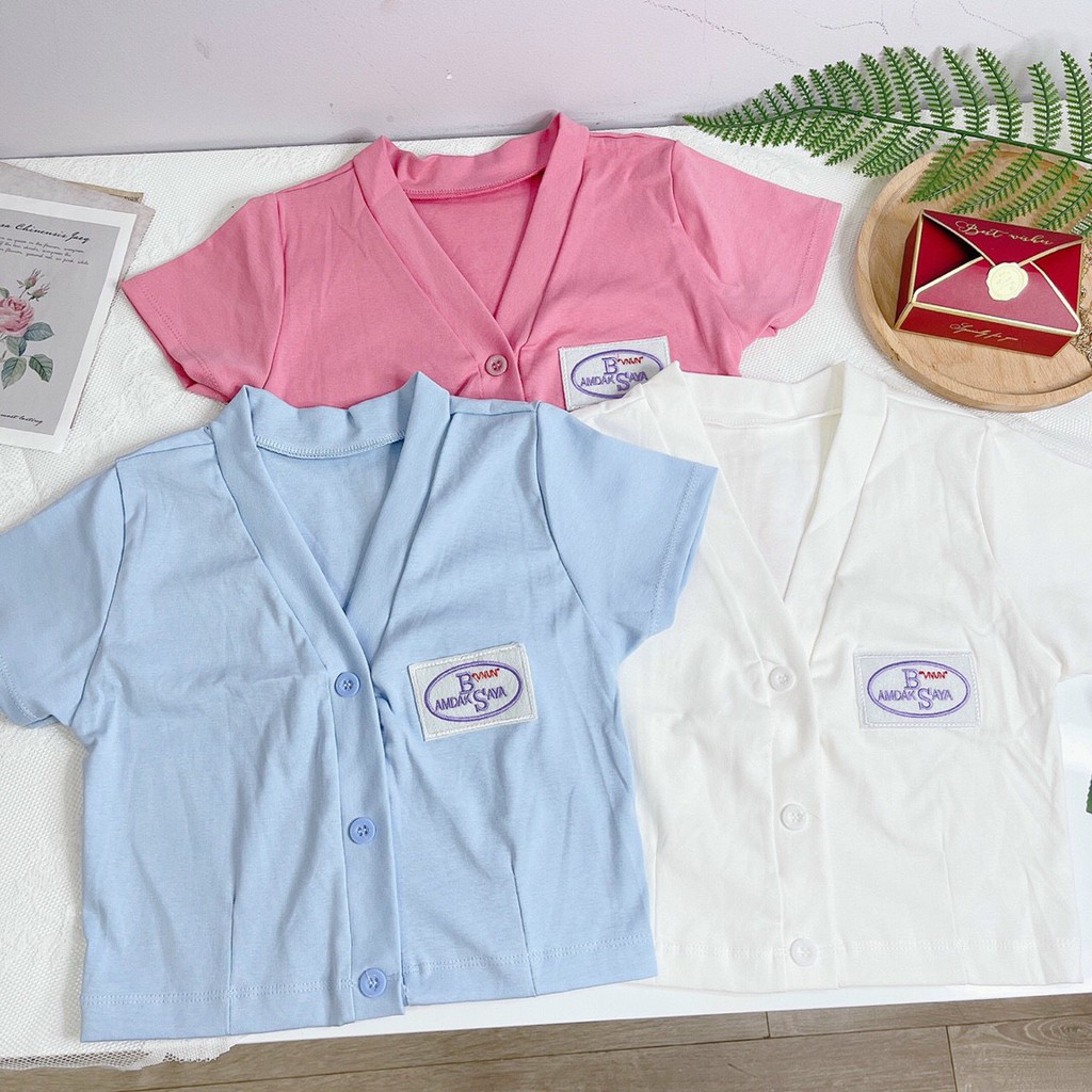 áo croptop cô tim cài nút thêu logo xinh