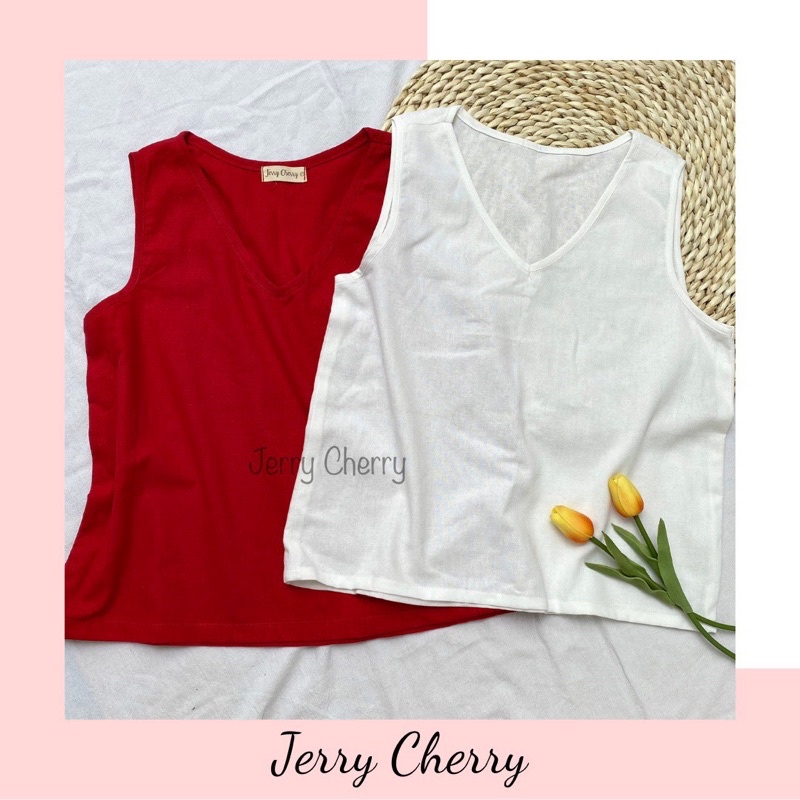 Áo linen sát nách cổ tim trơn