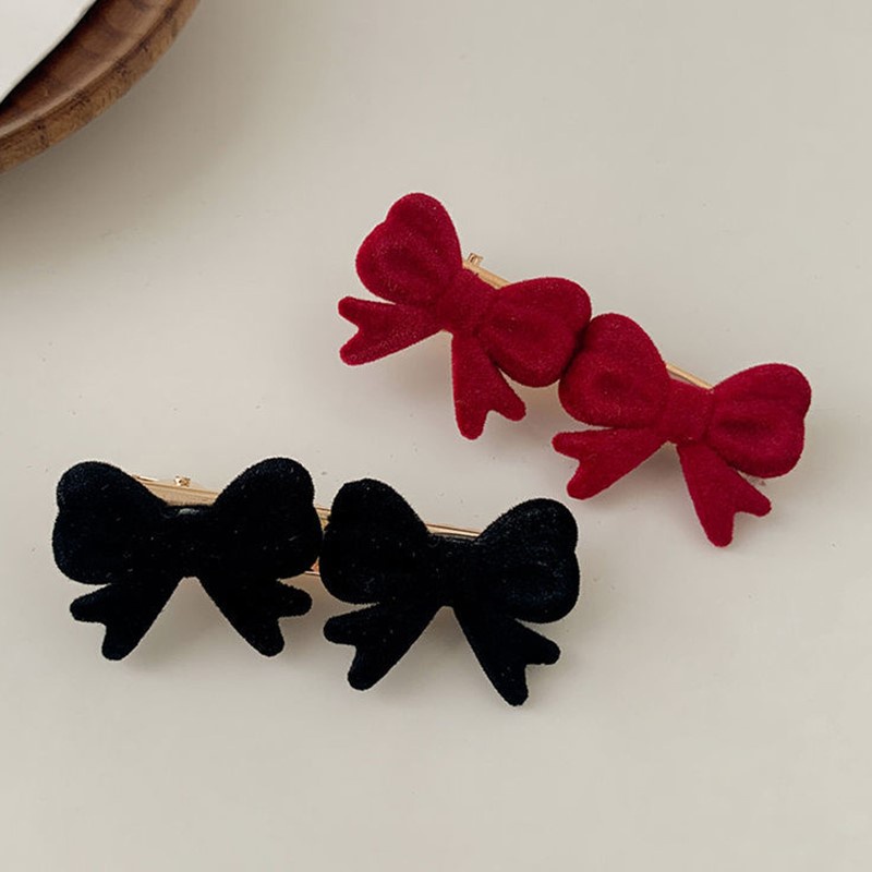 Kẹp tóc hình nơ xinh xắn cho nữ