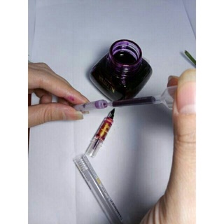 Pipet/Dụng cụ bơm mực.