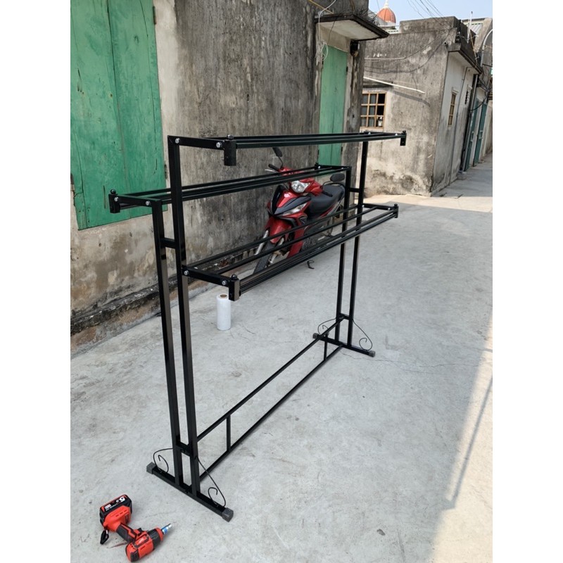 Kệ lệch 3 tầng treo quần áo cho shop