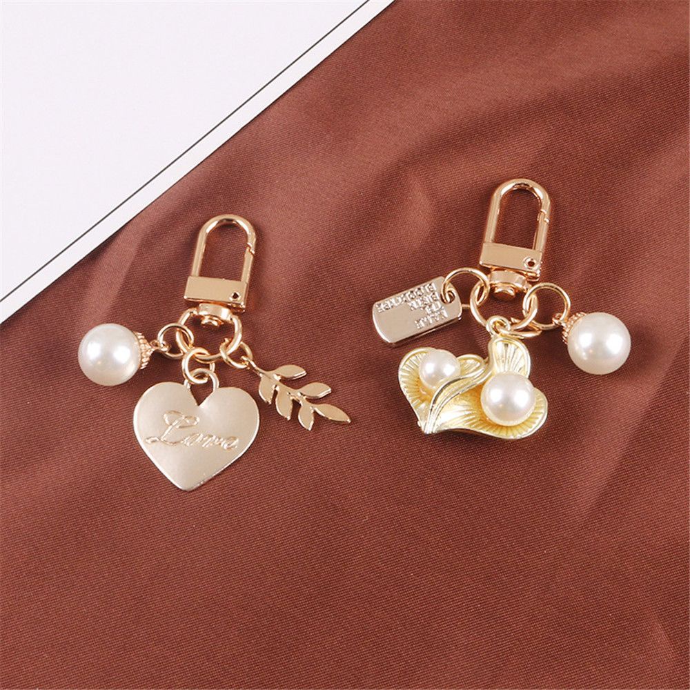 Móc khóa hình chiếc lá dễ thương MIHAN1