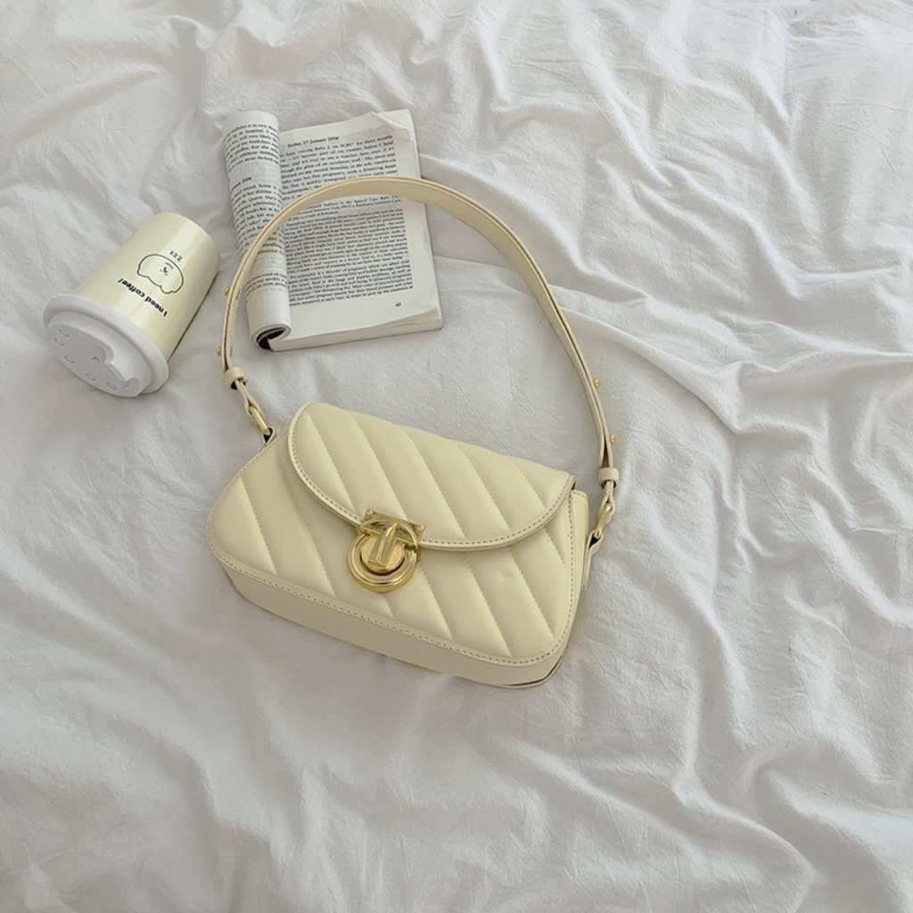 Túi đeo vai đeo chéo da mềm trần trám khóa tròn cá tính La.orie - La011