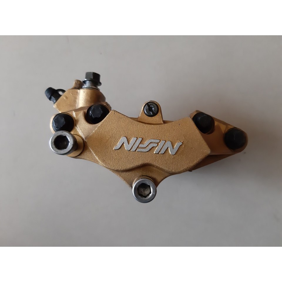 Heo dầu trước Nissin vàng 4 piston theo xe VTR1000