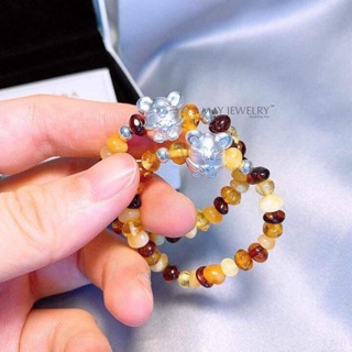 Vòng hổ phách trơn mix con giáp bạc cho bé