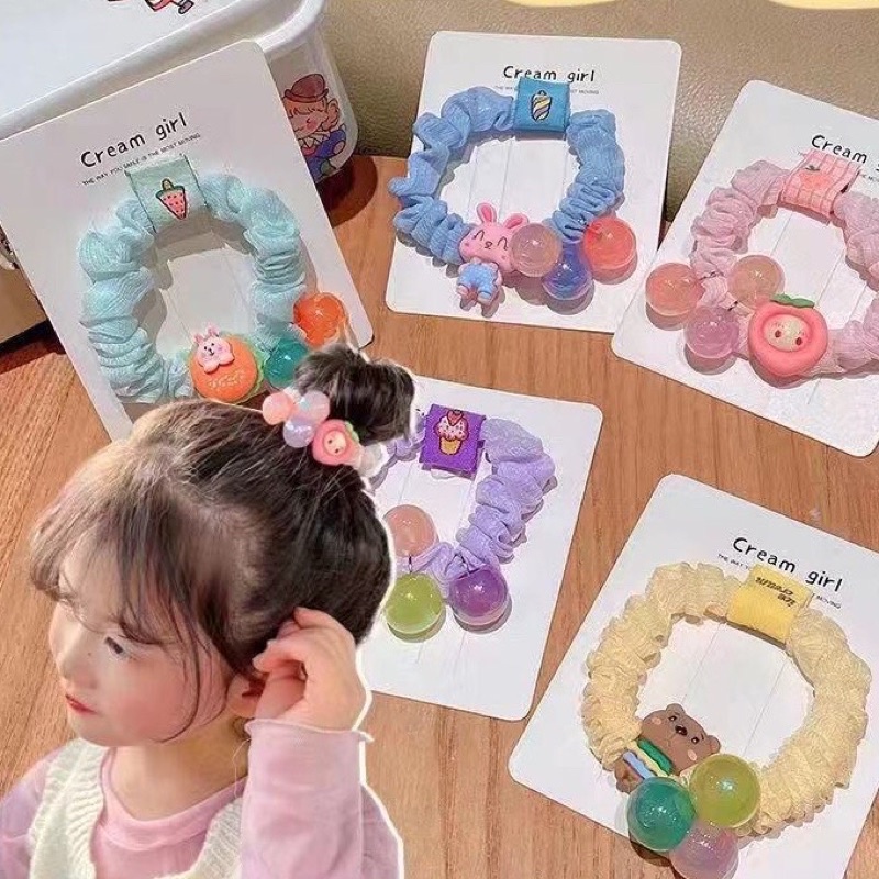 BUÔC TÓC NHÚNG ĐÍNH ICON PHỐI 3 HẠT CHÂU K518