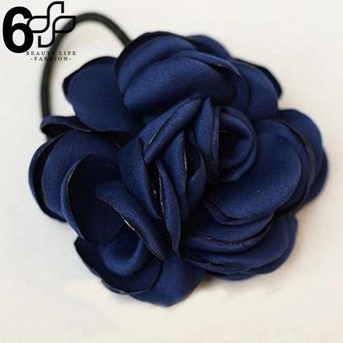 Cột tóc hình bông hoa trà