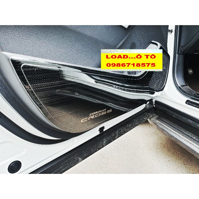 Ốp Tapli Cánh Cửa, Màng Loa Toyota Cross Vân Titan Cao cấp, Có Chữ Cross