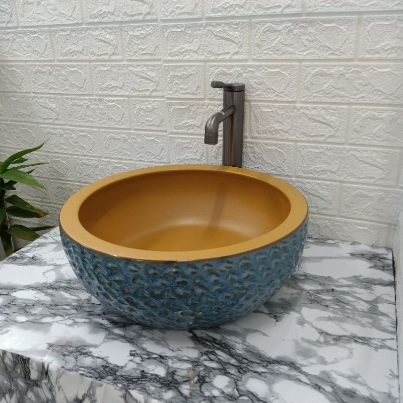 Chậu lavabo bàn đá men ngọc sứ giả đá