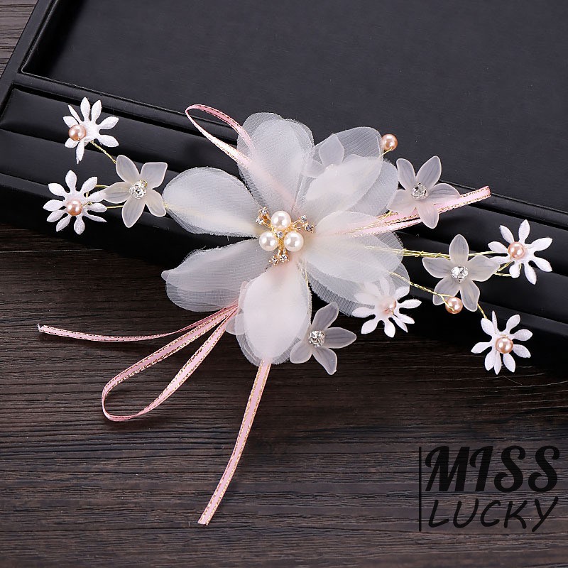 Phụ kiện cài tóc hoa đính ngọc trai hồng sang trọng cho cô dâu