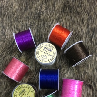 Mộc - Chỉ tơ chun xỏ hạt đá phong thủy ( loại mịn,  chắc)