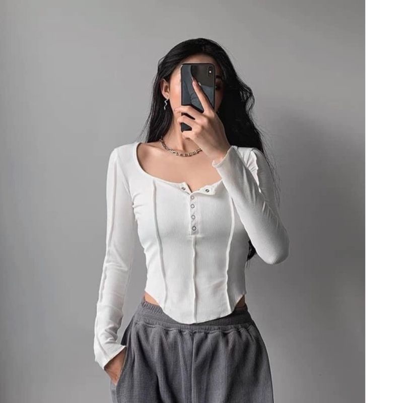 Áo thun kiểu choàng hở vai 1 bên và vạt bầu tay dài cài nút  A15