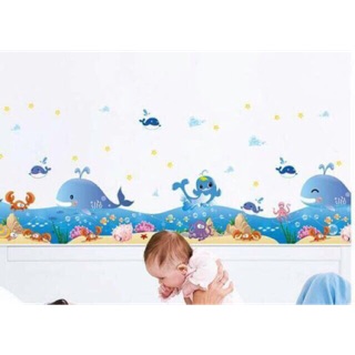 Decal tranh dán tường cá heo xanh và biển cả
