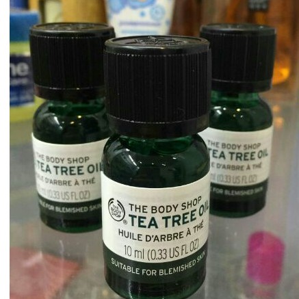 Tinh dầu tràm trà cho da mụn - Tea tree oil the body shop 10ml /chai