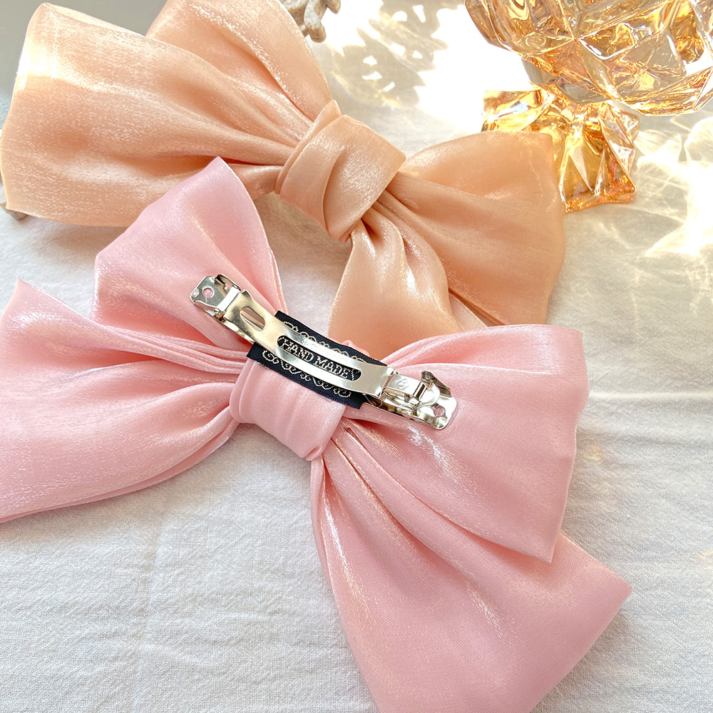 Kẹp tóc kiểu nơ thời trang dành cho nữ