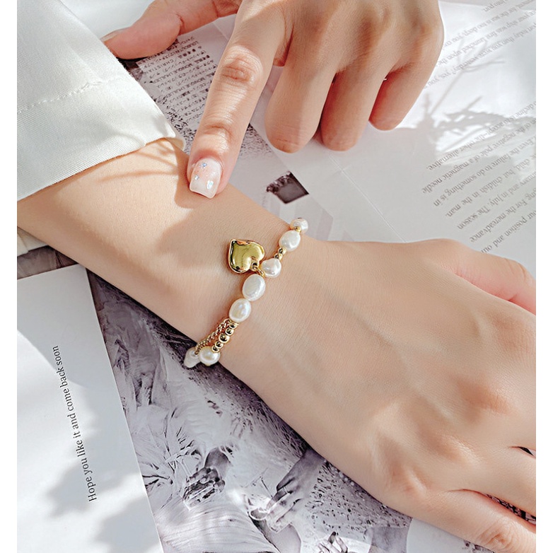 Lắc Tay Trái Tim Titan Ko Đen TT 4165