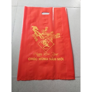 1kg túi đựng quà pe chúc mừng năm mới 40x60cm có in khoảng 16 - 17 cái