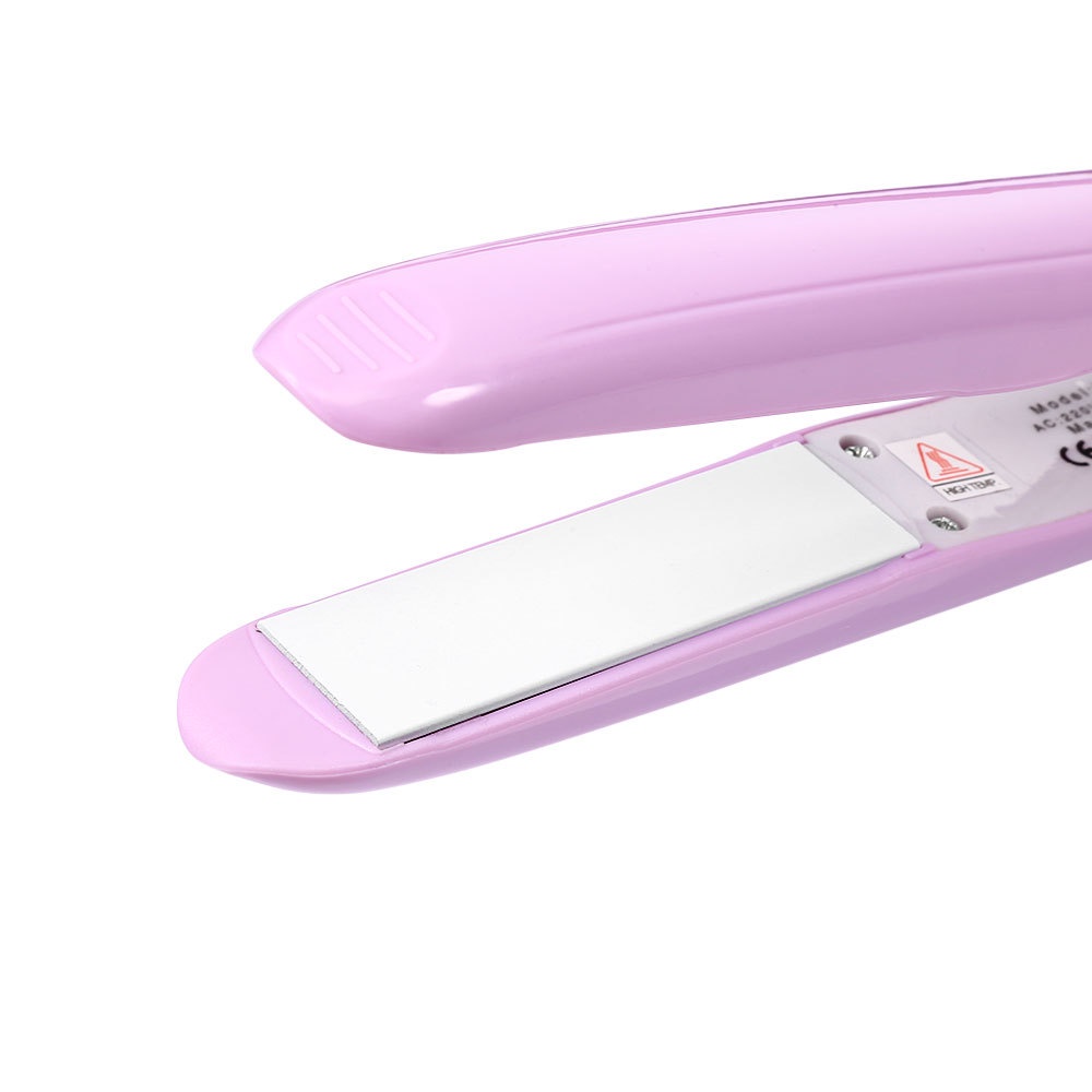 Máy duỗi tóc Kemei mini cầm tay