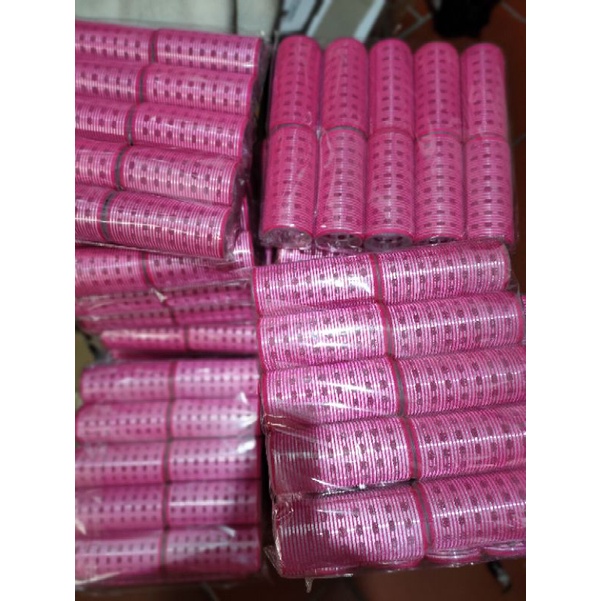 Lô uốn mái bay lõi nhôm có kích thước 5x12 cm mầu hồng đậm và 4x10.5 cm mầu hồng nhạt. lõi nhôm sấy tạo kiểu không sun