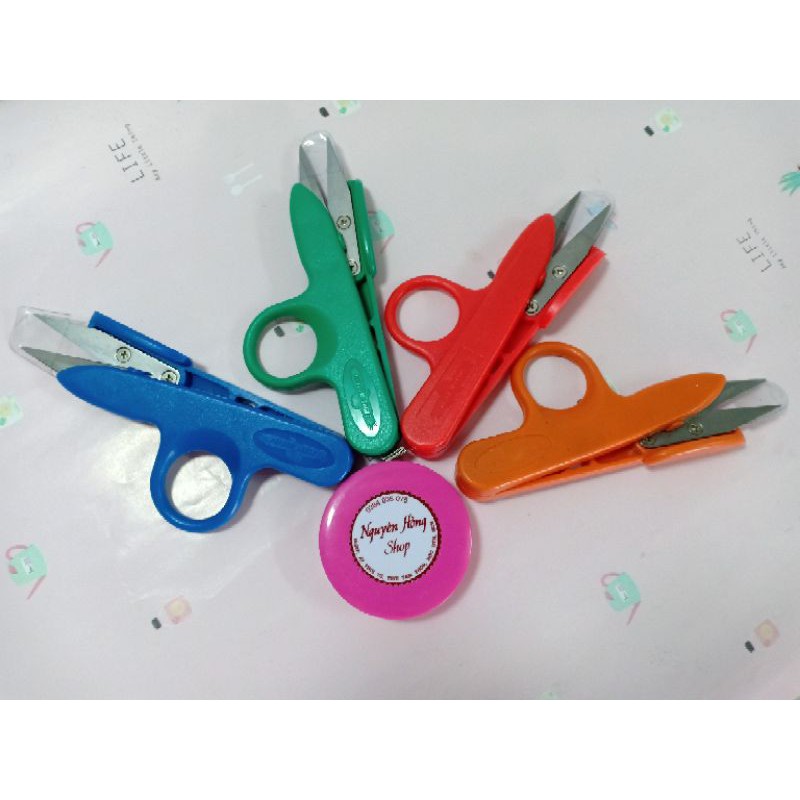 Kéo bấm chỉ xỏ ngón Hiệu golden eagle Tc801