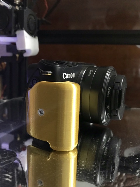 Bán cầm  cho máy ảnh Canon M10